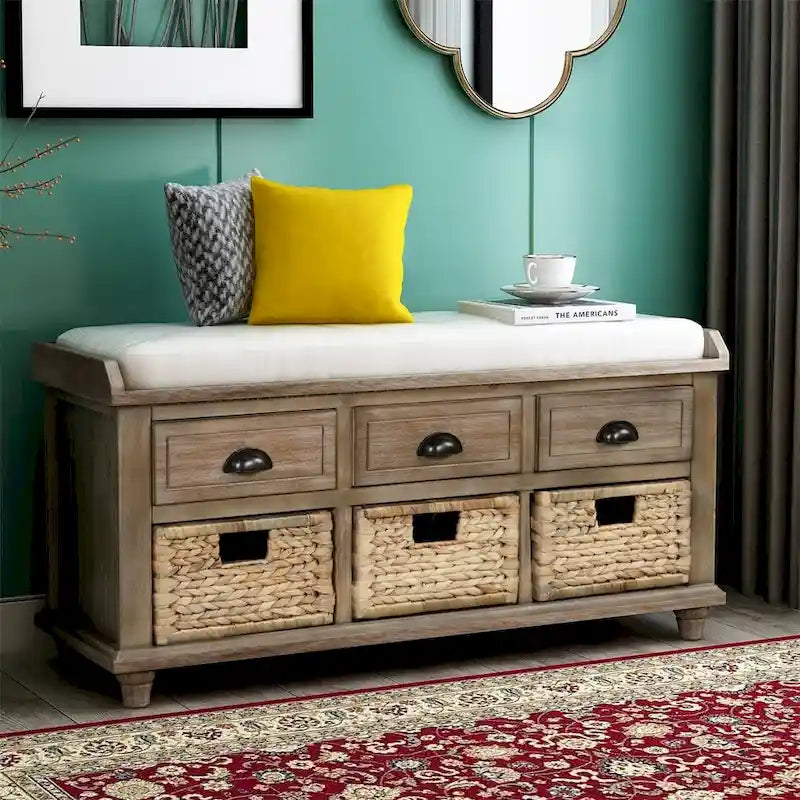 Three-drawer storage bench with three woven storage baskets.